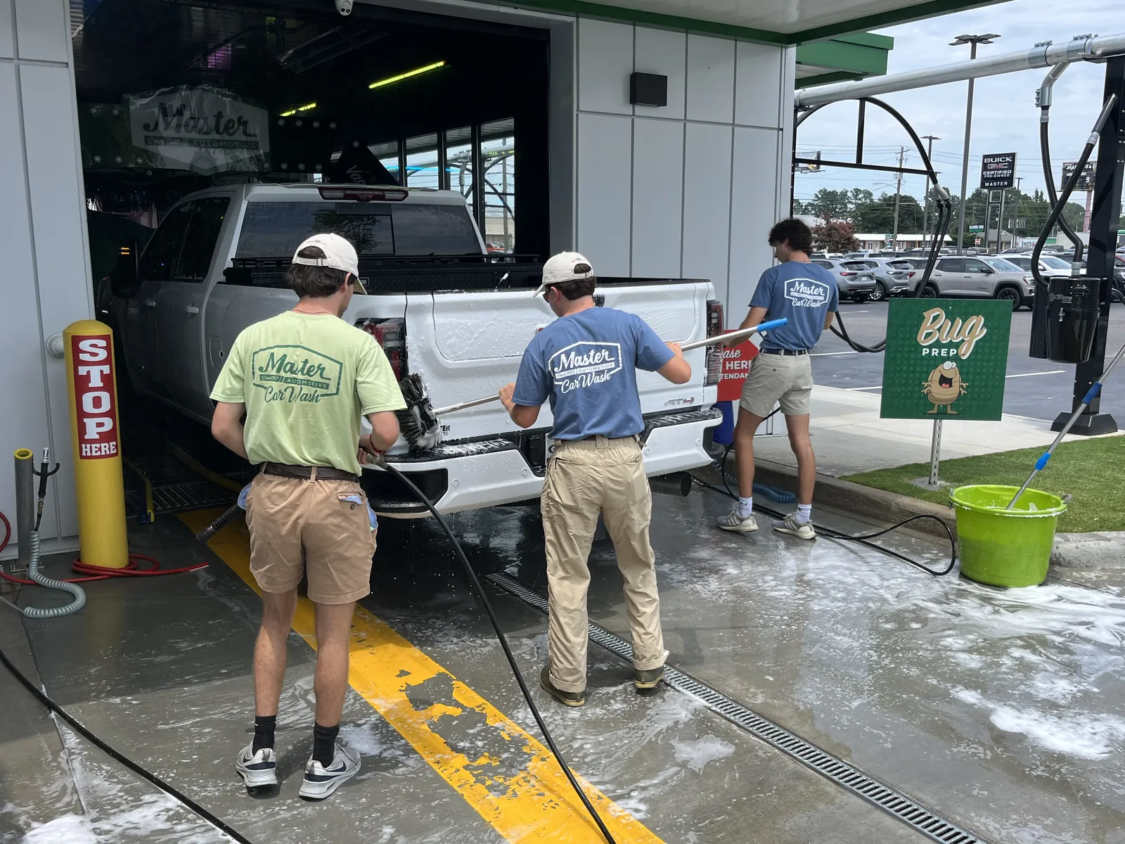 The Master Car Wash team washing a truck